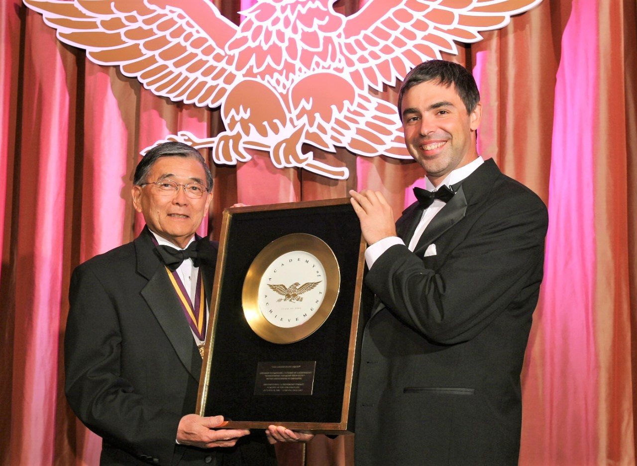 Awards Council member Larry Page presents the Golden Plate Award of the American Academy of Achievement to Norman Mineta